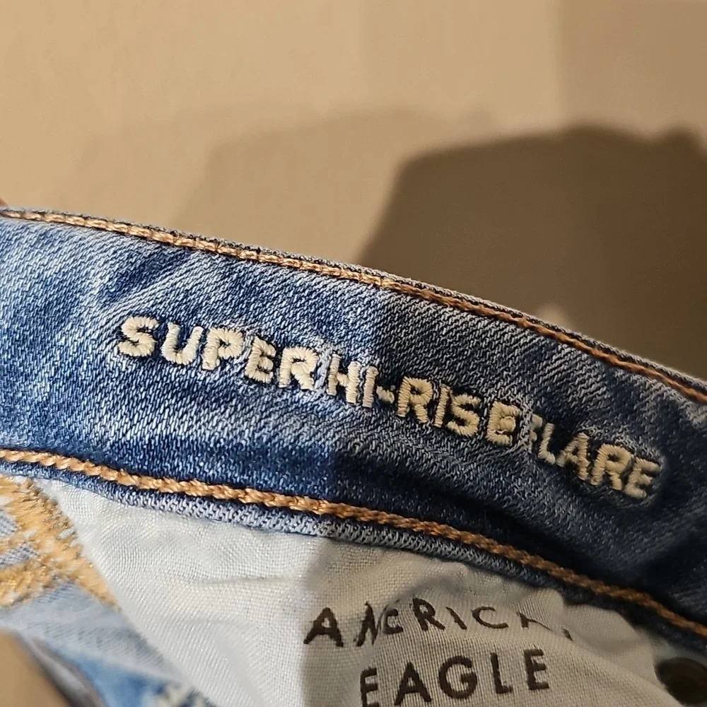 American Eagle Outfitters Super Hi-Rise Flare Size 10 Medium Blue Wide Leg Jeans - Picture 3 of 4